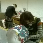Students Up-cycling in out lamp shades workshop